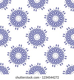 Floral seamless pattern. Mandala flower decorative elements. Ethnic abstract ornament. Oriental style background. Blue flowers on white background monochrome. Minimal flower pattern.