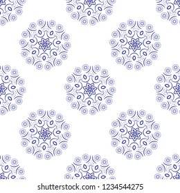 Floral seamless pattern. Mandala flower decorative elements. Ethnic abstract ornament. Oriental style background. Blue flowers on white background monochrome. Minimal flower pattern.