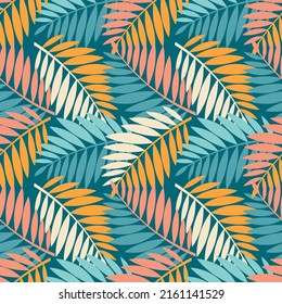 Floral seamless pattern with multicolor leaves and branches. Tropical leaves background. Botanical textile, wrapping paper