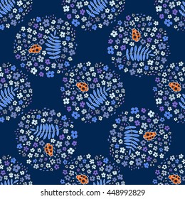 Floral seamless pattern. Multicolored elegant little flowers and funny bugs on a blue background, vector texture, illustration.