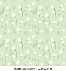 Floral seamless pattern on a green background