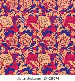 Floral seamless pattern with orange and red flowers on the dark blue background