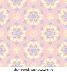 Floral seamless pattern. Pale pink background with light blue and yellow flower elements for wallpapers, textile and fabrics