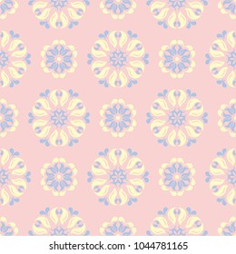 Floral seamless pattern. Pale pink background with light blue and yellow flower elements for wallpapers, textile and fabrics