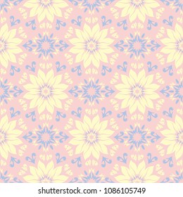 Floral seamless pattern. Pale pink background with light blue and yellow flower elements for wallpapers, textile and fabrics
