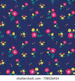 Floral seamless pattern with pink and yellow small flowers on blue speck background. Ditsy floral background. Elegant and tender vector illustration for print, scrapbooking, fabric, covers, wallpapers