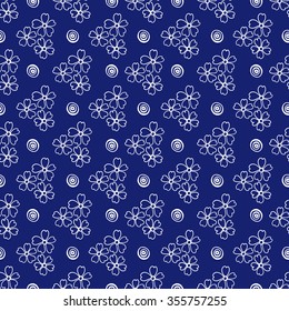 Floral seamless pattern in plant design. Blue and white graphics, flowers and circles on a white background.