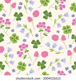 Floral seamless pattern with quatrefoil, shamrock, clover, bellflower on white background. Perfect for wallpaper, wrapping paper, fabric, spring and summer holidays. Hand drawn vector illustration