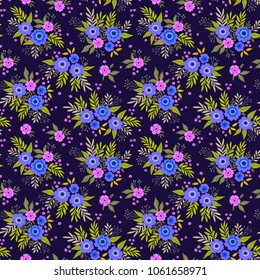 Floral seamless pattern with roses in vintage style. Surface design of blue flowers and leaves on a dark background. A bouquet of spring flowers for fashion prints. Modern floral background.