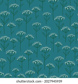 Floral seamless pattern. Rustic wildflowers wallpaper on a deep blue background.