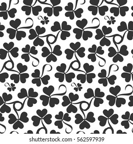 Floral seamless pattern. Saint Patrick's day background with shamrock. Abstract carpet of grass. Ireland symbol of lucky ornament. Design with clover leaves for decor card, web site, wrapping, textile