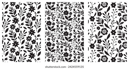  Floral seamless pattern set. Black doodle branches, flowers, leaves and berries on white background. Botanical monochrome design. Vector illustration.
