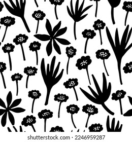 Floral seamless pattern with silhouettes flowers chamomile and exotic leaf. Black and white hand drawn botanical background. Monochrome botanical wallpaper with simple plants