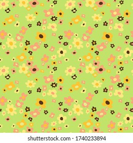 Floral seamless pattern with small doodle flowers. Hand drawn abstract flowers in pastel colors on green background. Cute simple botanical texture for textile ditsy print, wallpaper, gift wrap, cards.