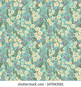 Floral seamless pattern with small flowers and leafs