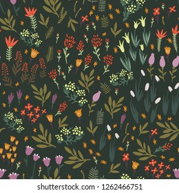 Floral seamless pattern. Spring flowers on a green background.