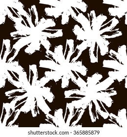Floral seamless pattern of stroke camomile pattern. Grunge white and black flowers