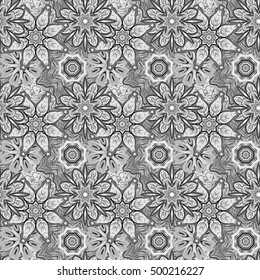 Floral seamless pattern with stylized snowflakes. Mandala floral background. Vector illustration. Gray