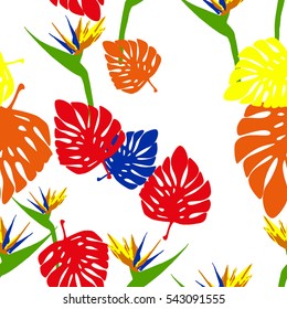 Floral seamless pattern tropical leaves monstera and flowers birds of paradise.
