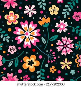 Floral seamless pattern. Vector illustration with small wild flowers. Millefleurs pattern for wrapping, fashion. Pink, red, green and turquoise colors on black background.