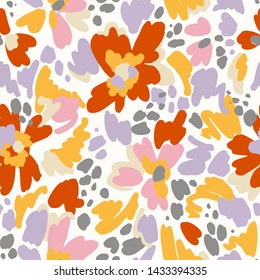 Floral seamless pattern in vintage style. Bright abstract flowers. Flower meadow. Multicolor brush strokes and brush spots. Simple botanical background. Flat design. Good for fashion, textile, fabric.