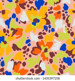 Floral seamless pattern in vintage style. Bright abstract flowers. Flower meadow. Multicolor brush strokes and brush spots. Simple botanical background. Flat design. Good for fashion, textile, fabric.