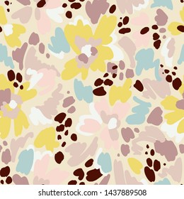 Floral seamless pattern in vintage style. Bright abstract flowers. Flower meadow. Multicolor brush strokes and brush spots. Simple botanical background. Flat design. Good for fashion, textile, fabric.