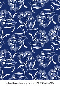 Floral seamless pattern. White eucalyptus plants on navy blue background. Beautiful vector illustration.