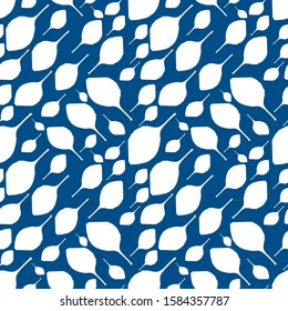 Floral seamless pattern with white leaves isolated on blue background in trendy color 2020 year in vector. Design for interior, wallpaper, textile,wrapping paper,print, greeting card. Simple leaves.