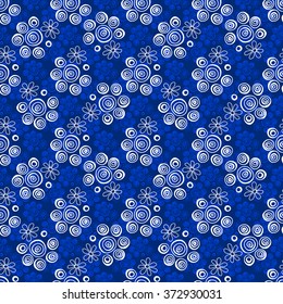Floral seamless pattern. White and light blue flowers and circles on a dark blue background, hand drawn, vector. For the design and decoration background, wallpaper, packaging, fabrics, textiles.