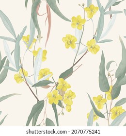 Floral seamless pattern, yellow golden shower flowers and eucalyptus leaves on bright yellow