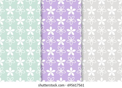 Floral seamless patterns. Collection of blue, violet and gray vertical backgrounds. Vector illustration