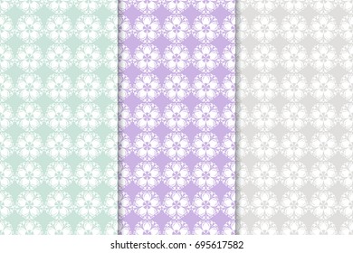 Floral seamless patterns. Collection of blue, violet and gray vertical backgrounds. Vector illustration