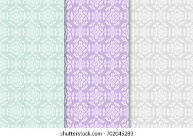 Floral seamless patterns. Collection of blue, violet and gray vertical backgrounds. Vector illustration