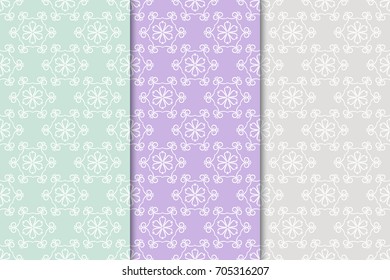 Floral seamless patterns. Collection of blue, violet and gray vertical backgrounds. Vector illustration