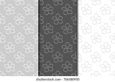 Floral seamless patterns. Collection of gray vertical backgrounds. Vector illustration