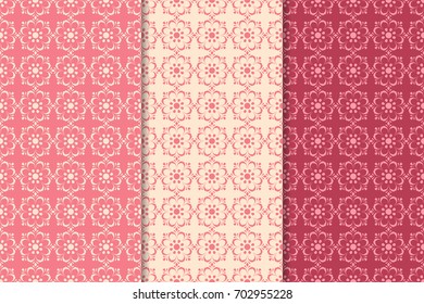 Floral seamless patterns. Set of cherry red abstract flower designs for fabrics and wallpapers. Vector illustration
