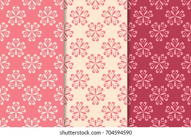 Floral seamless patterns. Set of cherry red abstract flower designs for fabrics and wallpapers. Vector illustration