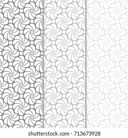 Floral seamless patterns. Set of light gray vertical backgrounds for fabrics and wallpapers