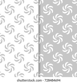 Floral seamless patterns. Set of light gray vertical backgrounds for fabrics and wallpapers