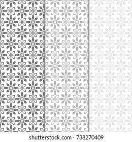 Floral seamless patterns. Set of light gray vertical backgrounds for fabrics and wallpapers