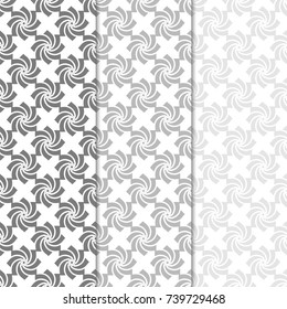 Floral seamless patterns. Set of light gray vertical backgrounds for fabrics and wallpapers