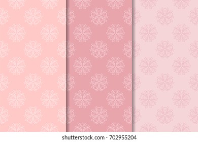 Floral seamless patterns. Set of pale pink abstract flower designs for fabrics and wallpapers. Vector illustration