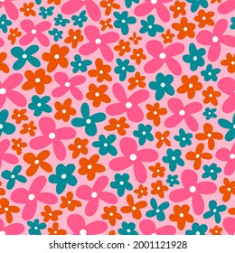 Floral seamless vector pattern with bright hand-drawn flowers on a pink background. For textile, print, package design, any backgrounds.