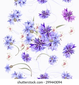 Floral seamless wallpaper pattern with blue cornflowers