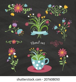Floral set on chalkboard