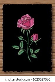 Floral stitched ornament with stitch rose. Embroidery flower on a dark flap cloth and wooden texture background. Ornamental needlework. Vector illustration.