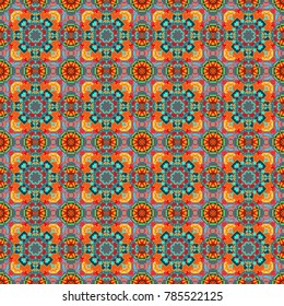 Floral symmetrical geometrical symbols seamless pattern. Colorful ethnic mandalas in blue, orange and pink colors. Arabesque vector ornament.