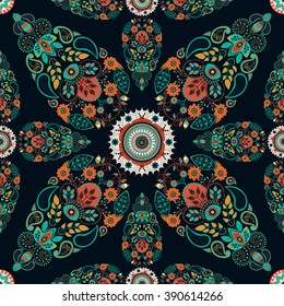 Floral symmetry seamless pattern. Vector indian decorative wallpaper. Colorful pattern with mandala and stylized flowers. Design for wrapping paper, web, cover, fabric, textile, curtains