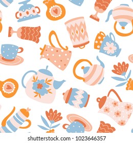 Floral Tea seamless pattern. Cute fabric design. Teapots, cups and flowers isolated on the white background.